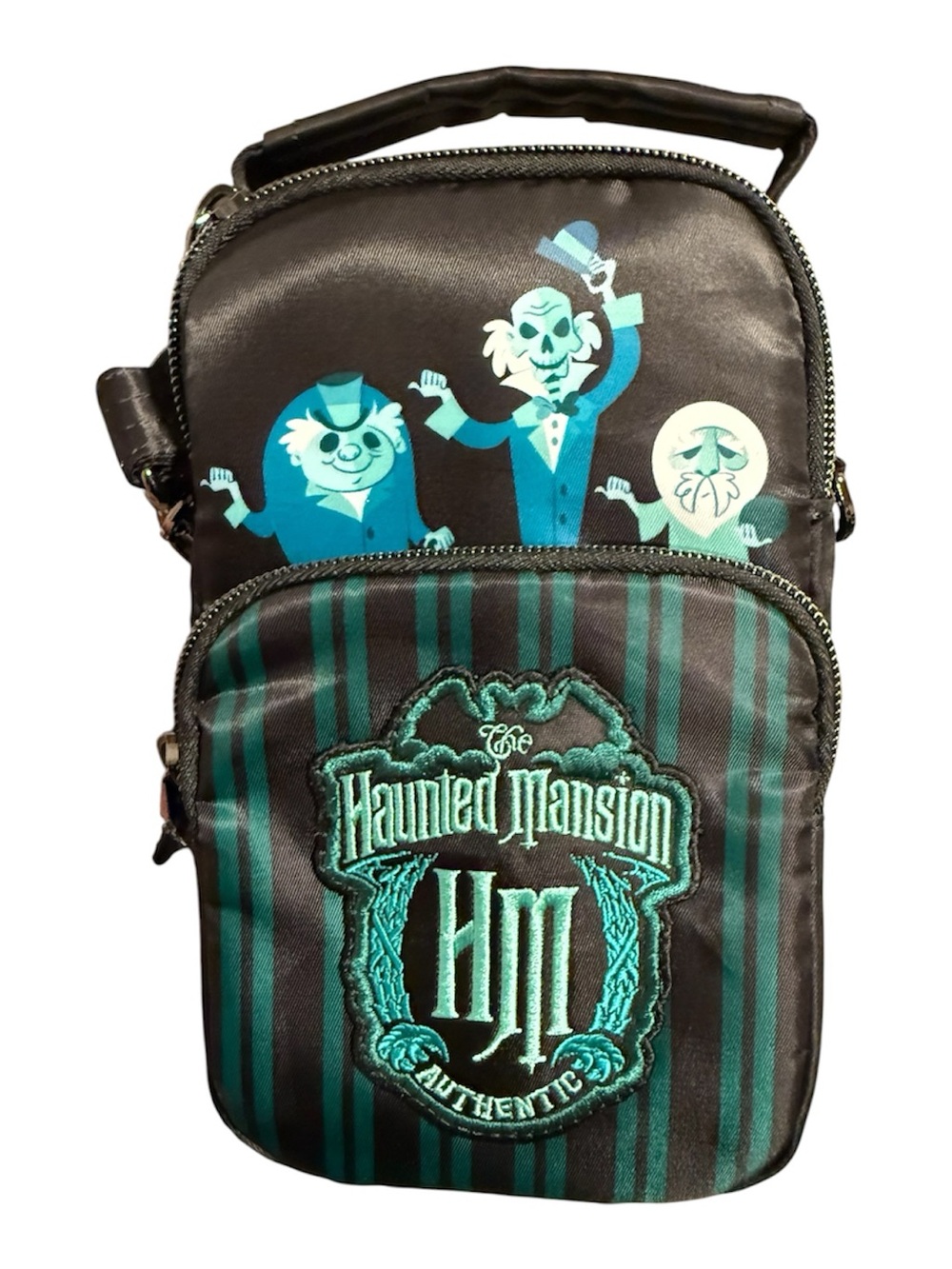 The Haunted Mansion lug crossbody bag. Disneyland parks
